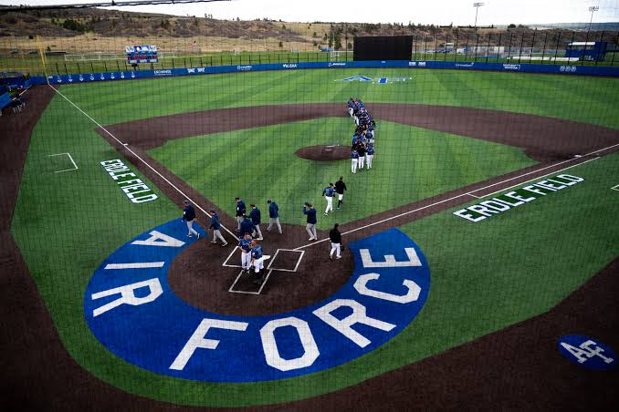 Air Force players gathered at home plate on Erdle Field